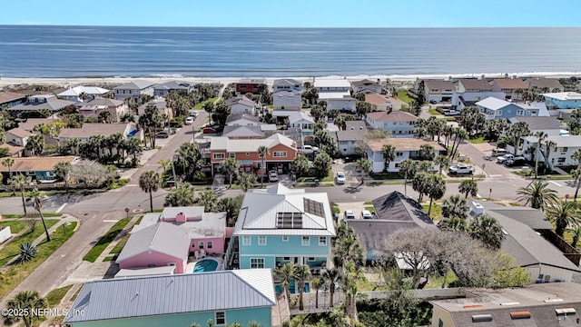 aerial view featuring a residential view and a water view