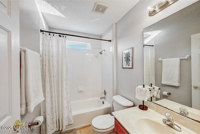 bathroom featuring visible vents, toilet, shower / bath combo, a textured ceiling, and vanity