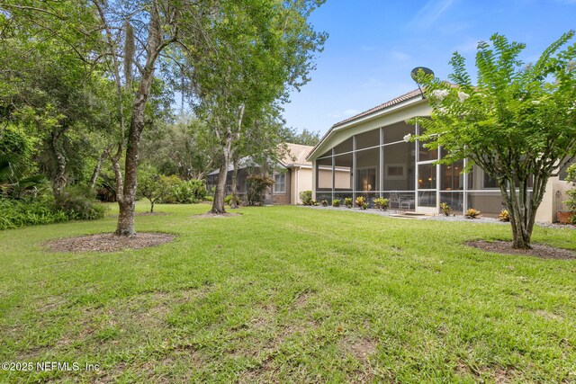 3 Village View Way, Palm Coast, FL 32137 - view of yard with a sunroom