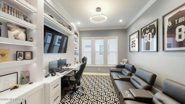 home office featuring built in features, baseboards, recessed lighting, built in desk, and crown molding