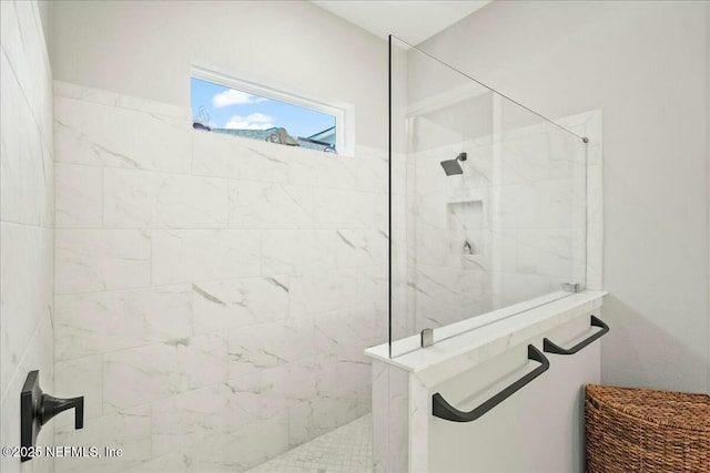 bathroom with a walk in shower