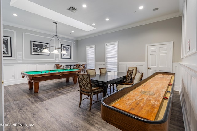 game room featuring billiards, dark wood-style floors, visible vents, ornamental molding, and a decorative wall