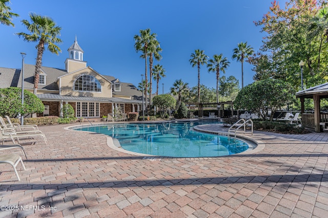 pool with a patio