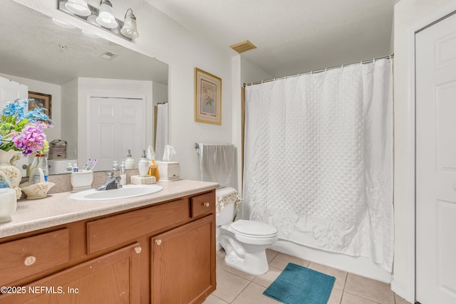 full bath featuring tile patterned floors, visible vents, toilet, shower / bath combo, and vanity