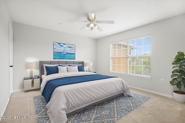 10961 Burnt Mill Rd Unit 1135, Jacksonville, FL 32256 - bedroom with carpet floors, baseboards, and ceiling fan