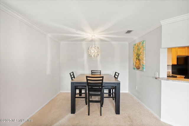 10961 Burnt Mill Rd Unit 1135, Jacksonville, FL 32256 - dining area with a chandelier, ornamental molding, baseboards, and light colored carpet