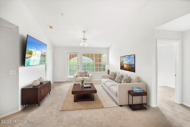 10961 Burnt Mill Rd Unit 1135, Jacksonville, FL 32256 - living area with baseboards, vaulted ceiling, a ceiling fan, and carpet floors