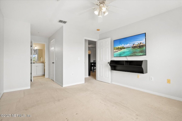 10961 Burnt Mill Rd Unit 1135, Jacksonville, FL 32256 - unfurnished living room with visible vents, baseboards, a ceiling fan, and carpet