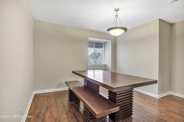 8880 Old Kings Rd S Unit 84, Jacksonville, FL 32257 - unfurnished dining area featuring baseboards and hardwood / wood-style flooring