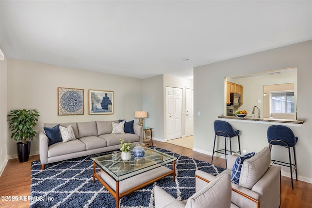 8880 Old Kings Rd S Unit 84, Jacksonville, FL 32257 - living area featuring baseboards and wood finished floors