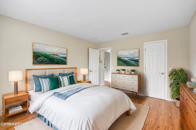 8880 Old Kings Rd S Unit 84, Jacksonville, FL 32257 - bedroom featuring visible vents and light wood-type flooring
