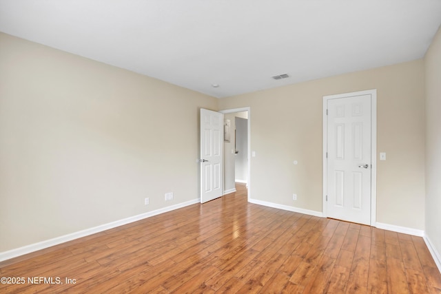 8880 Old Kings Rd S Unit 84, Jacksonville, FL 32257 - unfurnished bedroom with visible vents, light wood-type flooring, and baseboards