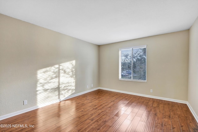 8880 Old Kings Rd S Unit 84, Jacksonville, FL 32257 - empty room with baseboards and wood finished floors