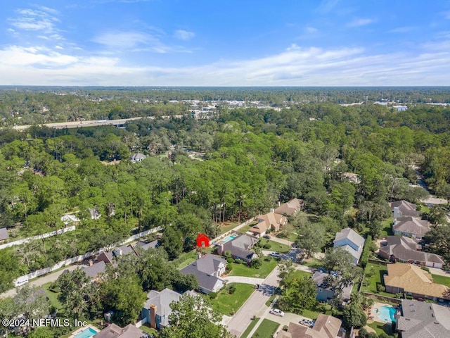 2619 Wrightson Dr, Jacksonville, FL 32223 - drone / aerial view with a residential view and a forest view