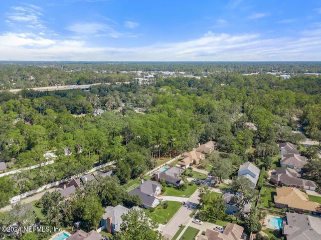 2619 Wrightson Dr, Jacksonville, FL 32223 - birds eye view of property featuring a residential view and a forest view