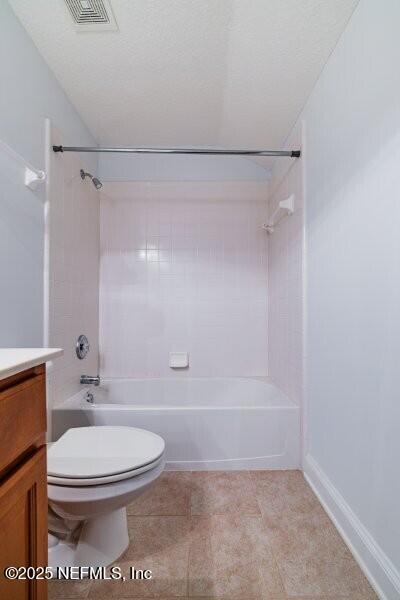full bath with visible vents, toilet, vanity, shower / bathtub combination, and a textured ceiling