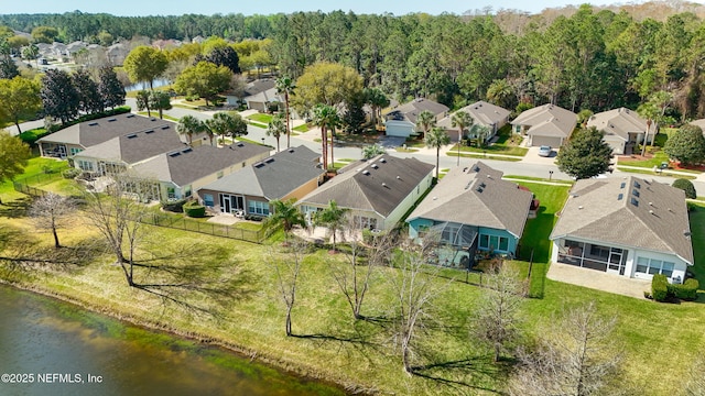 birds eye view of property with a residential view