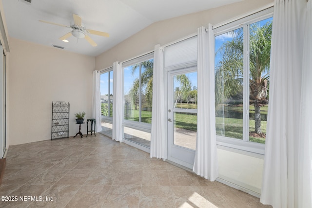 unfurnished sunroom featuring visible vents