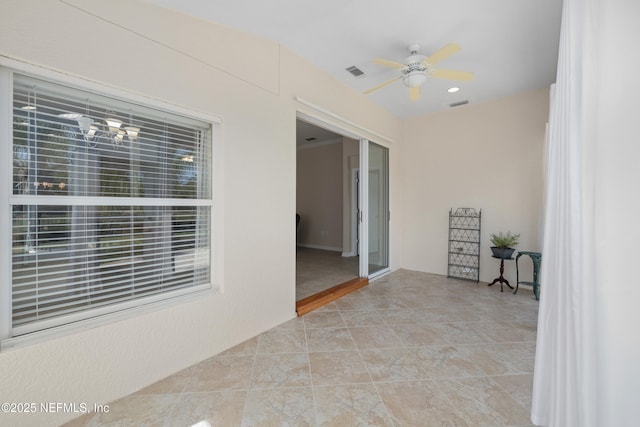 view of patio / terrace featuring visible vents and ceiling fan