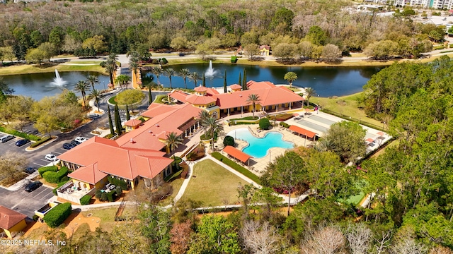 drone / aerial view with a water view