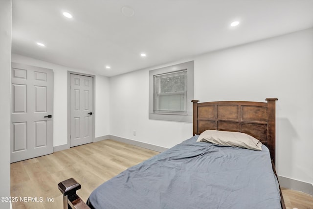 6099 Milligan Rd, Keystone Heights, FL 32656 - bedroom with recessed lighting, light wood-type flooring, and baseboards