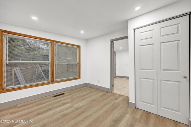 6099 Milligan Rd, Keystone Heights, FL 32656 - unfurnished room with recessed lighting, visible vents, and light wood-style flooring