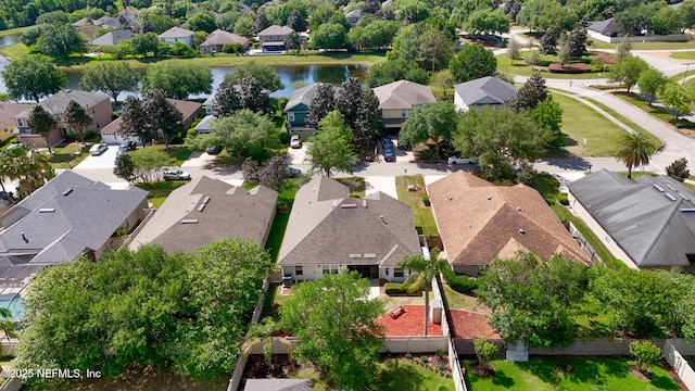 aerial view with a water view and a residential view
