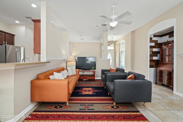 living room featuring visible vents, baseboards, ceiling fan, recessed lighting, and light tile patterned flooring