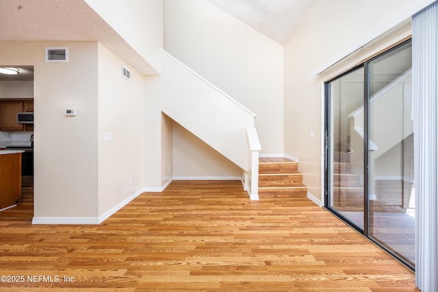 8331 Pineverde Ln, Jacksonville, FL 32244 - interior space with visible vents, baseboards, and wood finished floors