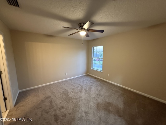 3549 Victoria Lakes Dr W, Jacksonville, FL 32226 - empty room featuring visible vents, a textured ceiling, ceiling fan, and carpet