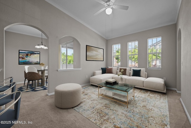 10075 Gate Pkwy Unit 1301, Jacksonville, FL 32246 - carpeted living room featuring ceiling fan with notable chandelier, crown molding, a healthy amount of sunlight, and arched walkways