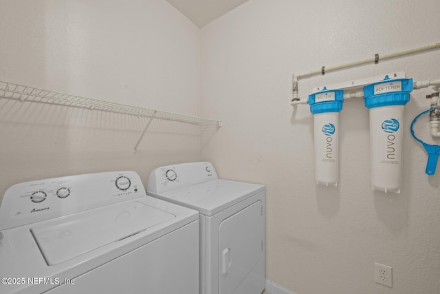 10075 Gate Pkwy Unit 1301, Jacksonville, FL 32246 - clothes washing area with laundry area and washing machine and clothes dryer