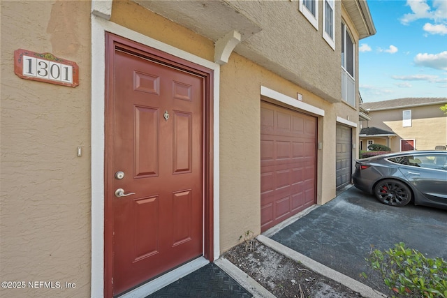 10075 Gate Pkwy Unit 1301, Jacksonville, FL 32246 - property entrance with stucco siding