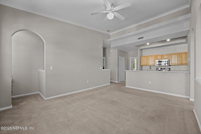 10075 Gate Pkwy Unit 1301, Jacksonville, FL 32246 - unfurnished living room featuring visible vents, baseboards, ceiling fan, and crown molding