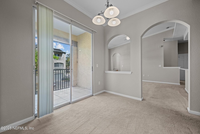 10075 Gate Pkwy Unit 1301, Jacksonville, FL 32246 - spare room with arched walkways, carpet flooring, and crown molding