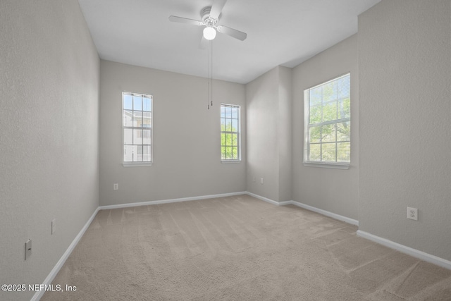 10075 Gate Pkwy Unit 1301, Jacksonville, FL 32246 - carpeted spare room with baseboards, ceiling fan, and a textured wall