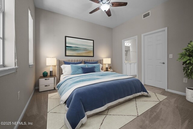 10075 Gate Pkwy Unit 1301, Jacksonville, FL 32246 - bedroom featuring visible vents, carpet flooring, ensuite bathroom, and baseboards