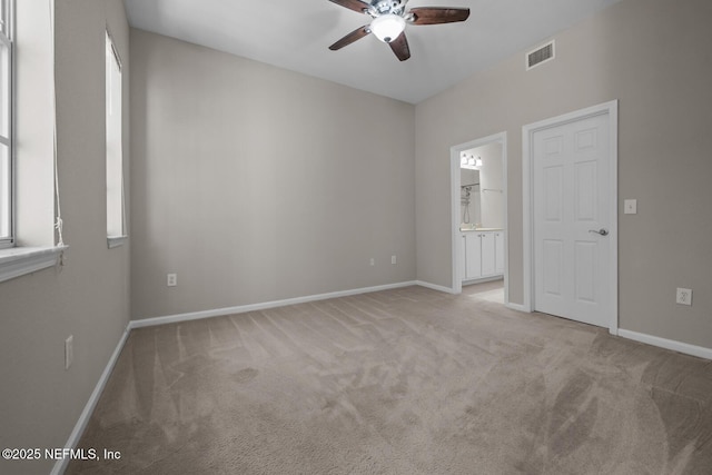 10075 Gate Pkwy Unit 1301, Jacksonville, FL 32246 - unfurnished room featuring visible vents, baseboards, carpet, and a ceiling fan