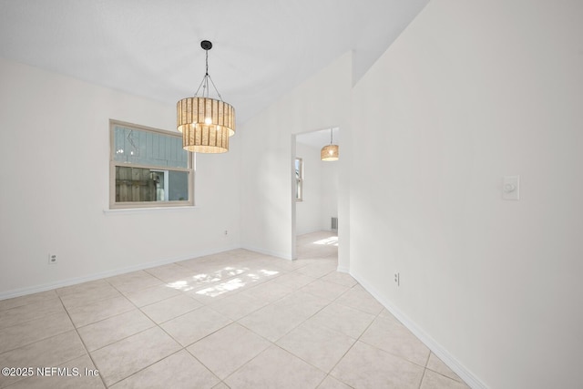 interior space featuring tile patterned flooring, visible vents, lofted ceiling, baseboards, and a notable chandelier