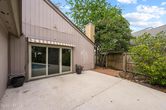 view of patio with fence