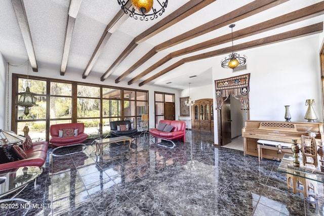 living area with vaulted ceiling with beams and a textured ceiling