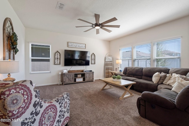 3214 Little Fawn Ln, Green Cove Springs, FL 32043 - carpeted living area featuring visible vents, baseboards, a textured ceiling, and a ceiling fan