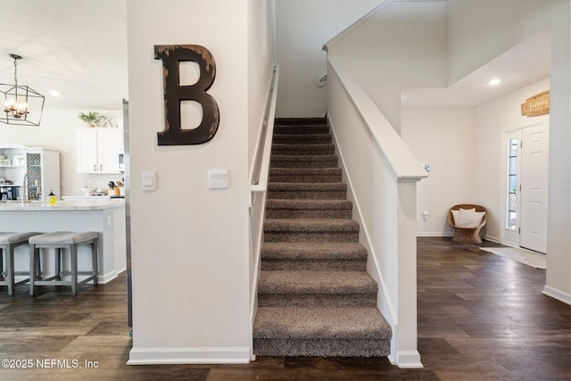 3214 Little Fawn Ln, Green Cove Springs, FL 32043 - staircase with recessed lighting, a notable chandelier, wood finished floors, and baseboards