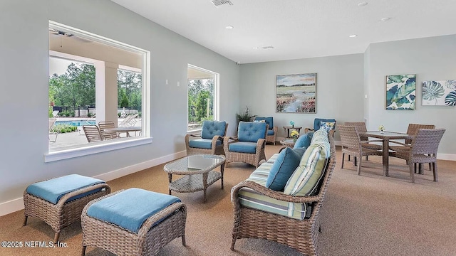 3214 Little Fawn Ln, Green Cove Springs, FL 32043 - carpeted living area featuring visible vents and baseboards
