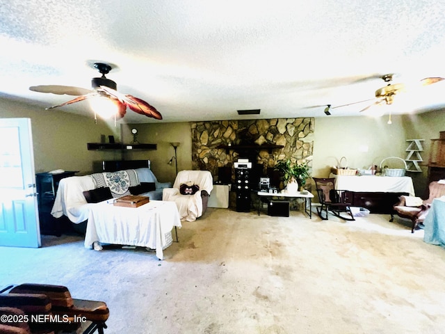 bedroom featuring a textured ceiling and ceiling fan