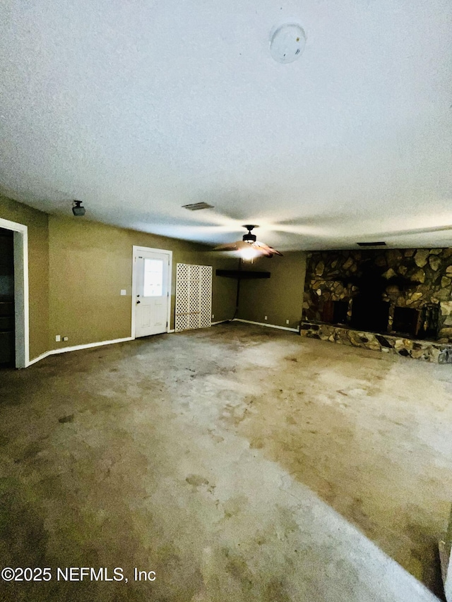 2731 Howard Rd, Middleburg, FL 32068 - unfurnished living room with a ceiling fan and carpet floors