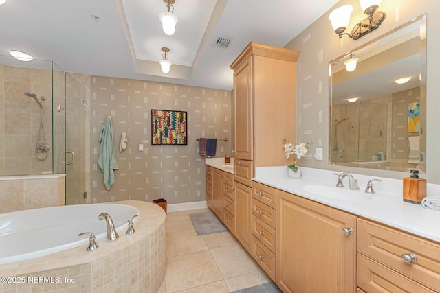 525 3rd St N Unit 210, Jacksonville Beach, FL 32250 - full bath with visible vents, a shower stall, a tray ceiling, and a garden tub