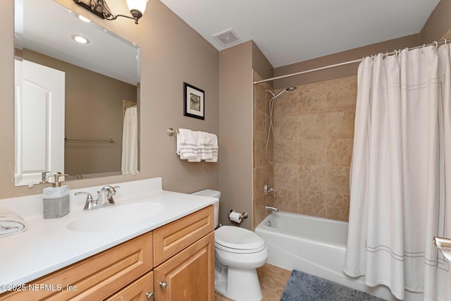 525 3rd St N Unit 210, Jacksonville Beach, FL 32250 - bathroom with vanity, visible vents, tile patterned flooring, shower / tub combo, and toilet
