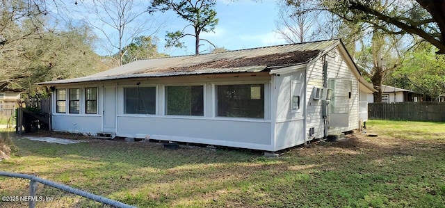 86798 Hester Dr, Yulee, FL 32097 - view of side of property featuring fence and a lawn