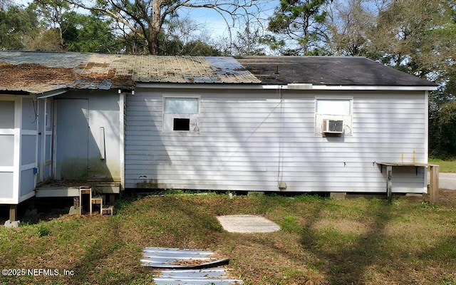 86798 Hester Dr, Yulee, FL 32097 - view of property exterior with a yard and cooling unit